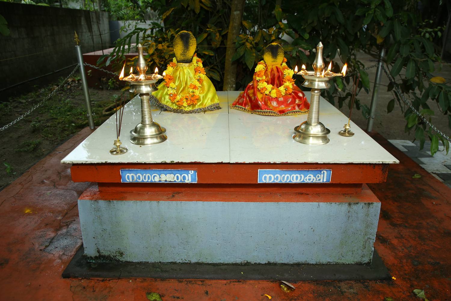 Nagarajavu and Nagayakshi shrine under the trees