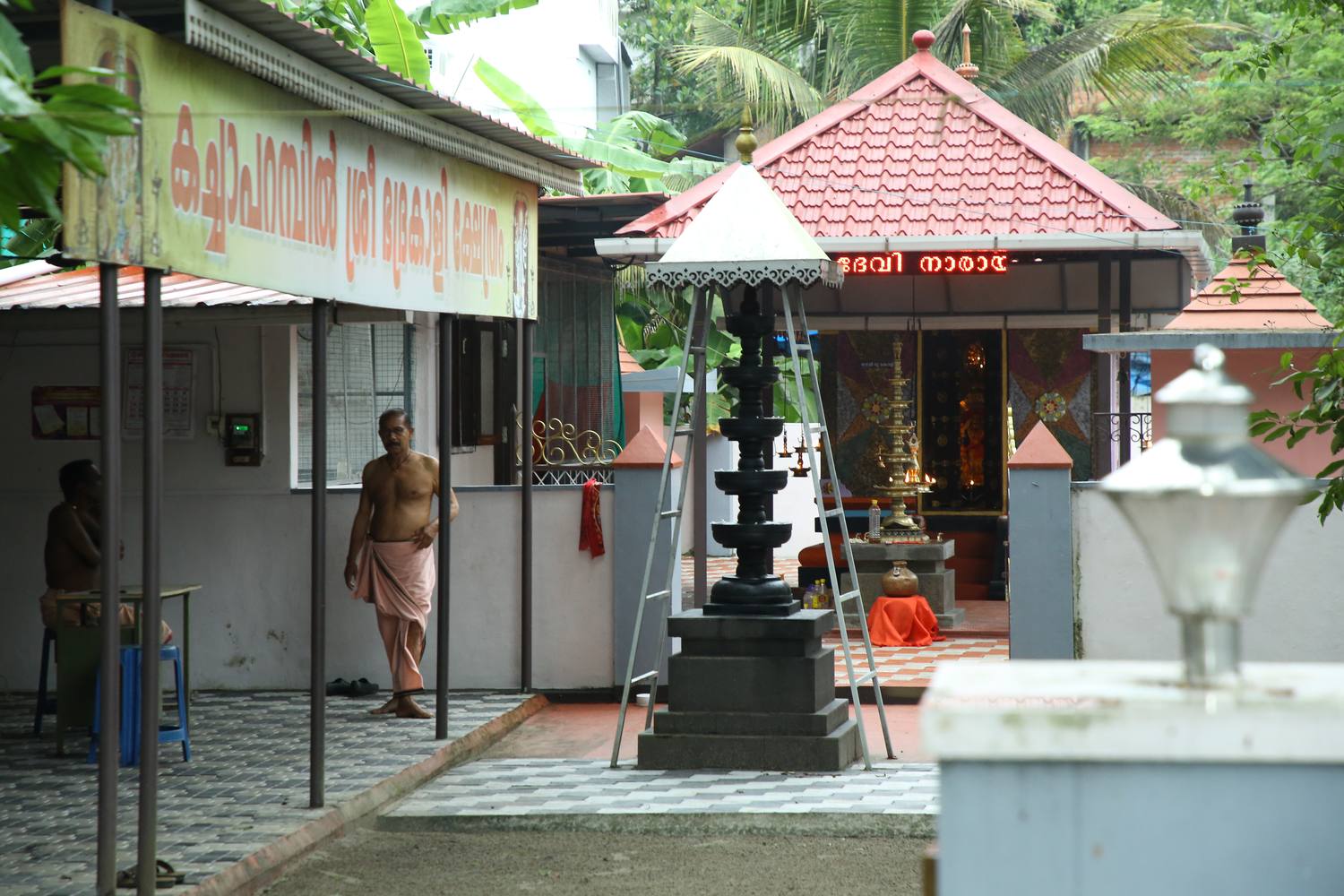 Priest at the temple courtyard